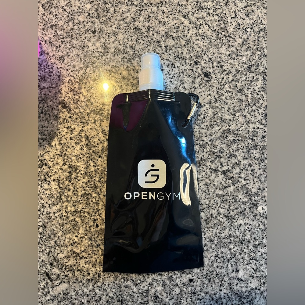 Never Used Open Gym Reusable Collapsible Black Water Bottle